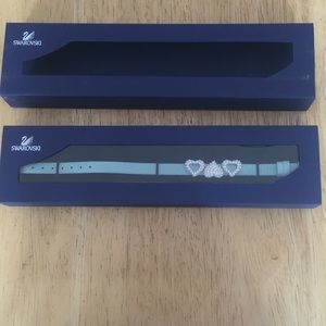 Swarovski teal blue leather bracelet with charms.